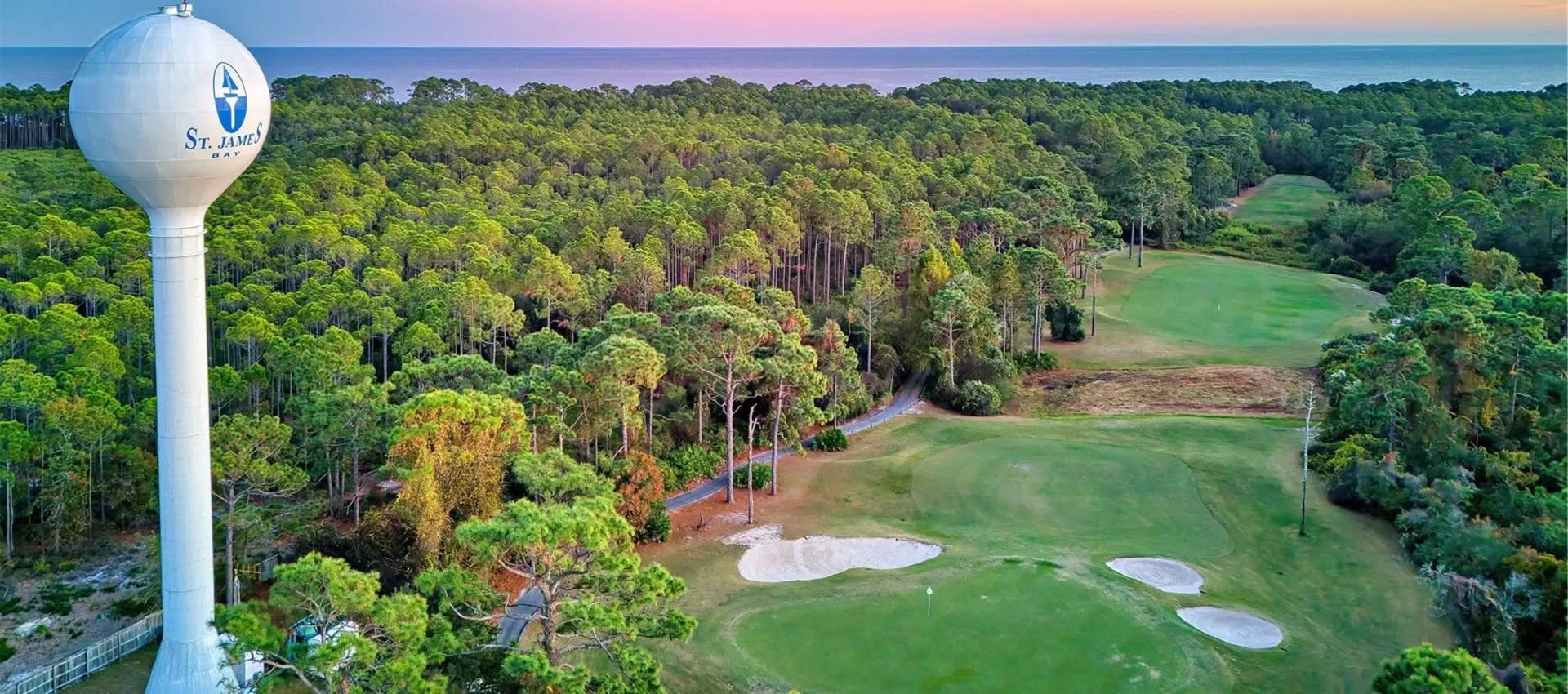 Aerial view of the St. James Bay golf course and the Carrabelle water tower